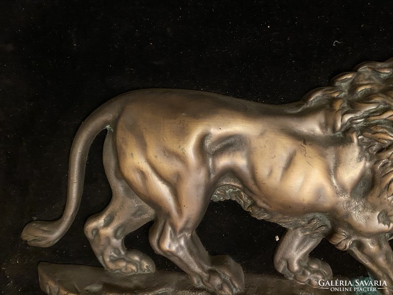 Cast bronze lion mural