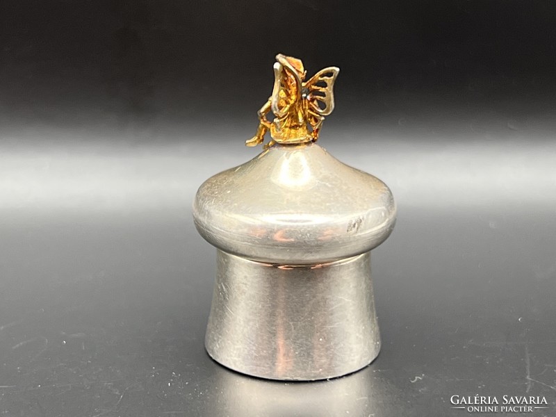 A special silver box/box with a fairy/elf figure with butterfly wings