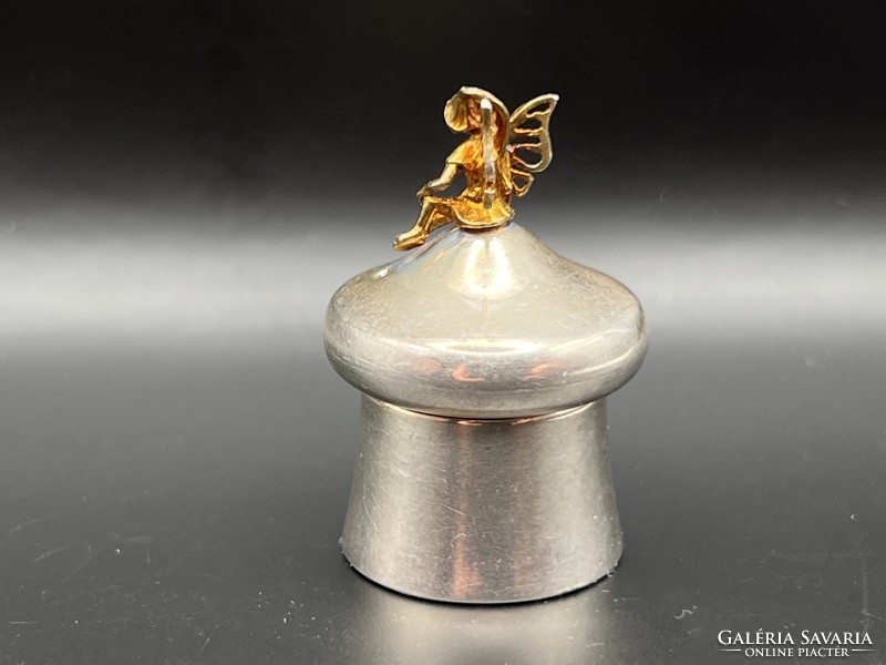 A special silver box/box with a fairy/elf figure with butterfly wings