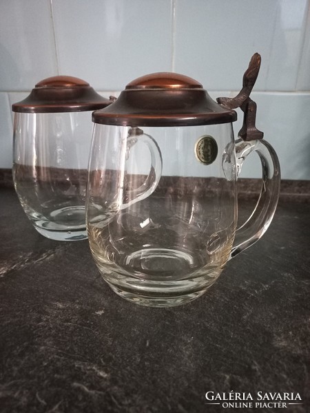 2 hand-blown beer mugs with a copper lid