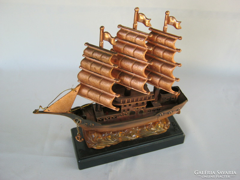 Illuminated musical plastic sailing ship