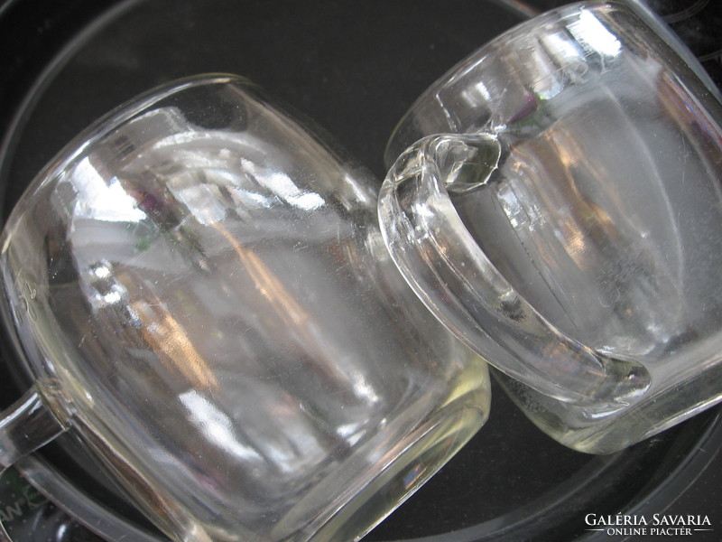 Pair of retro ball shaped jars calibrated, polished