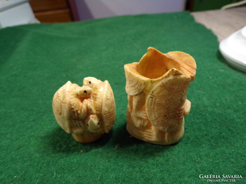 Bone figurine with turtles, hollow inside, I don't know what was kept inside