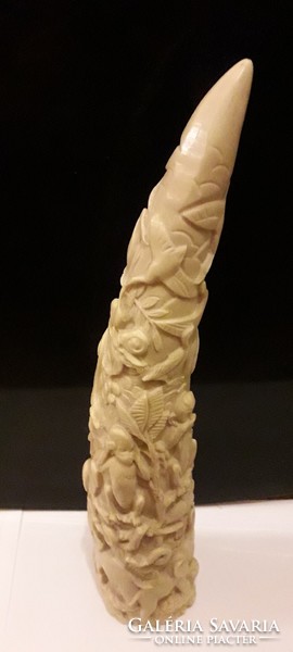 Ivory. With plant and animal motifs. About 1950