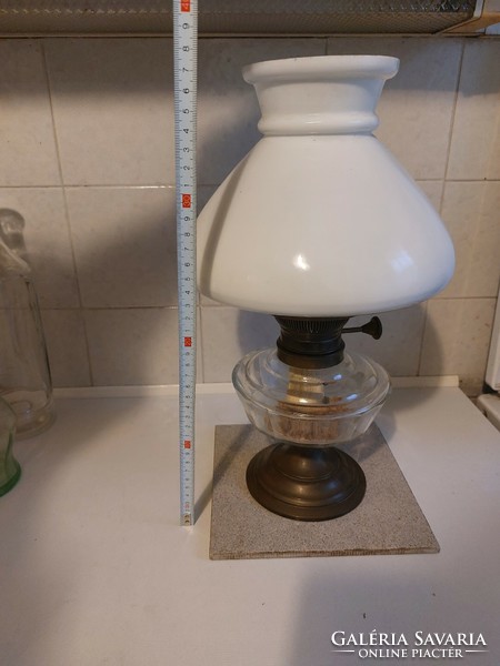 A copper kerosene lamp made at the beginning of the 20th century, with an original milk glass shade
