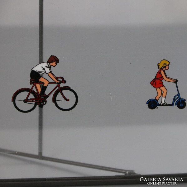 Transparent retro slide projector image in a metal frame. Bicycle & scooter