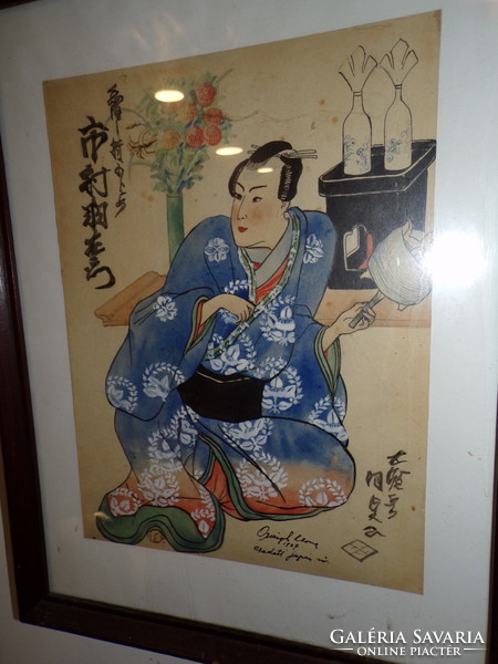 Japanese geisha painting in a frame