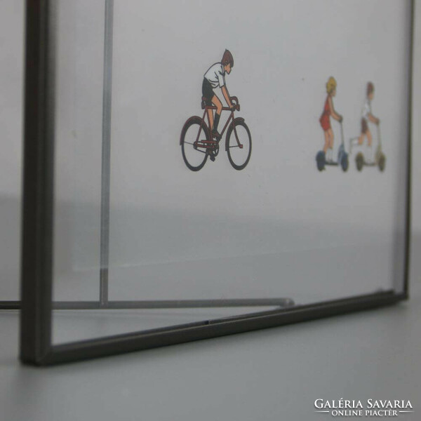 Transparent retro slide projector image in a metal frame. Bicycle & scooter