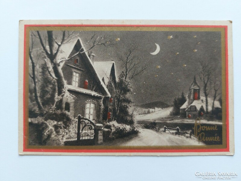 Old Christmas postcard 1941 postcard evening snowy street scene