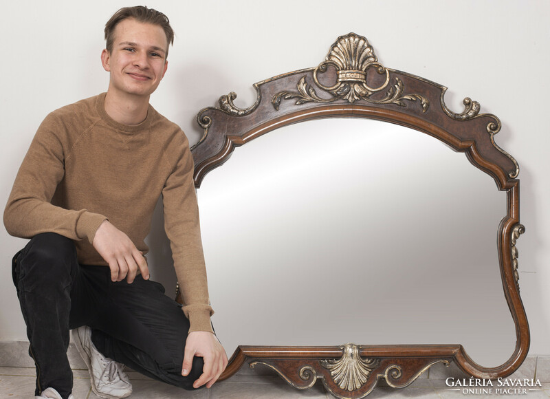 Wooden framed mirror, decorated with a shell motif