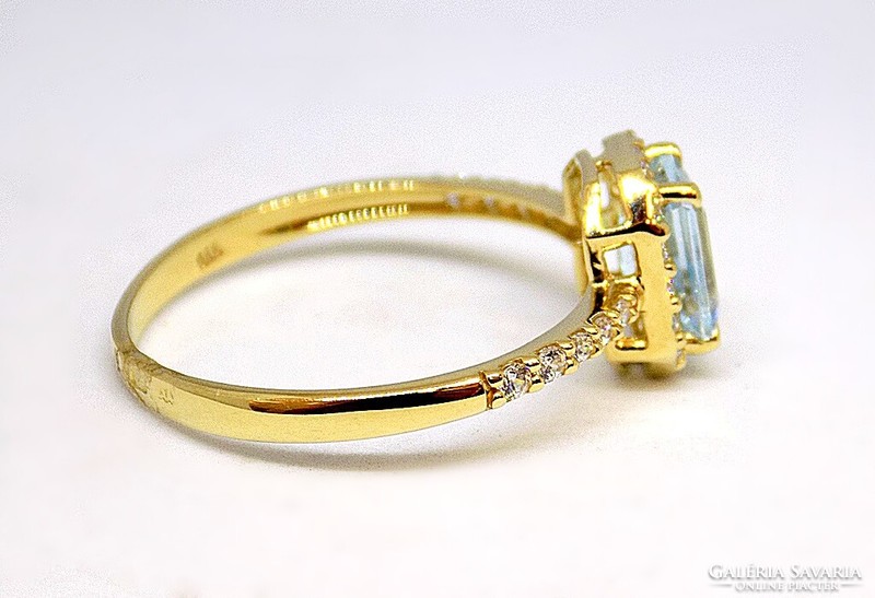 Gold ring with blue topaz stones (zal-au113596)