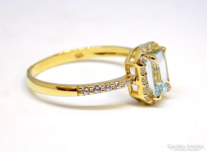 Gold ring with blue topaz stones (zal-au113596)
