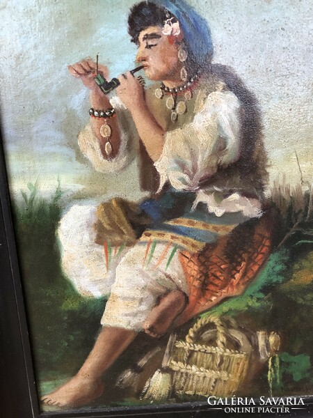 Signed painting of a gypsy girl smoking a pipe in a gilded blondel frame