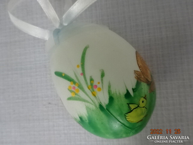 Easter egg decoration, with a white bunny on a green background, 3 pieces. He has!