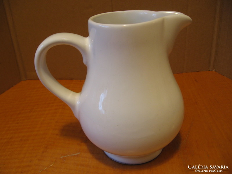 White ceramic milk jug