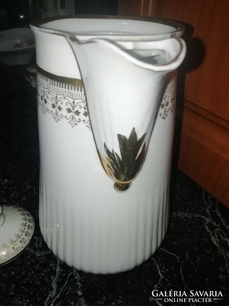 Antique porcelain tea pourer in perfect condition