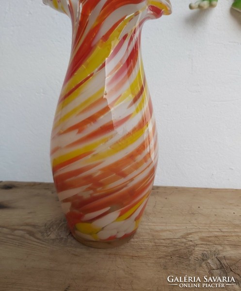 A beautiful midcentury yellow glass vase is a collector's beauty