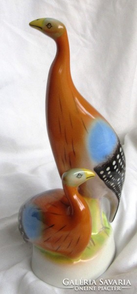 Older raven house porcelain guinea fowl pair marked, hand painted 19 cm high.