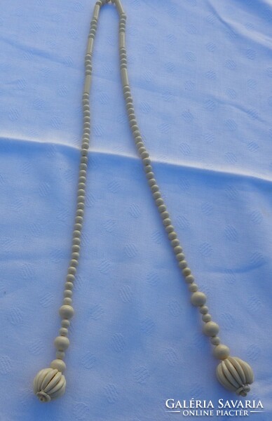 String of pearls with an old bone look