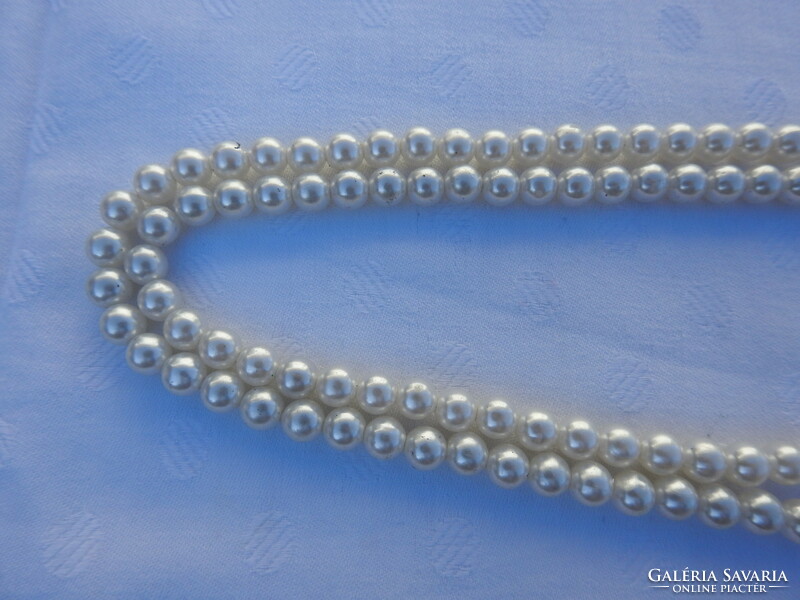 Old long string of pearls - pearl necklace