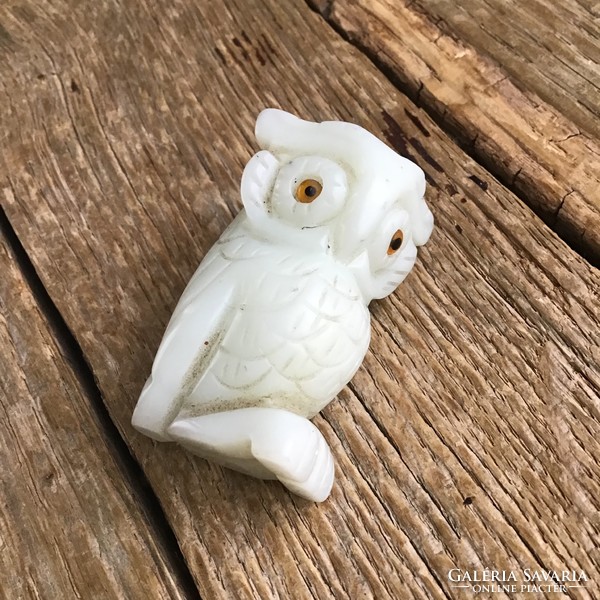 Owl figurine carved from old jade mineral