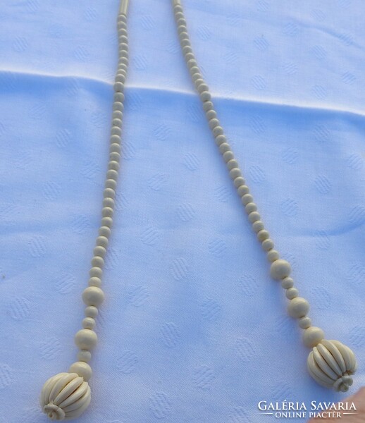String of pearls with an old bone look