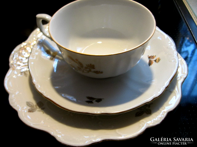 Antique gilded cup with matching small plate