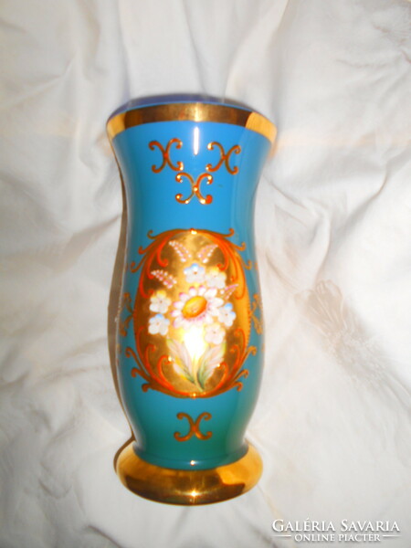 Glass vase with bohemian plastic porcelain flowers in a rare shade of blue, antique, serial number at the bottom