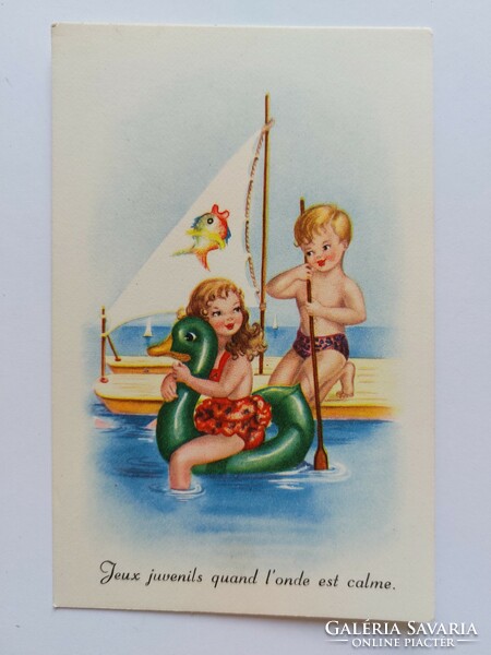 Old postcard with cartoon children on the beach