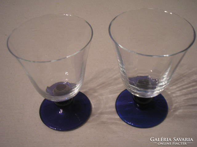 The rarity of 2 glasses of liqueur sitting on a thick-footed ball is flawless and for sale