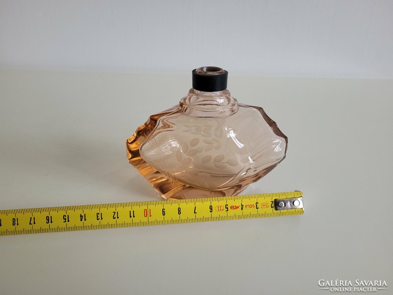 Old perfume bottle pink polished art deco cologne