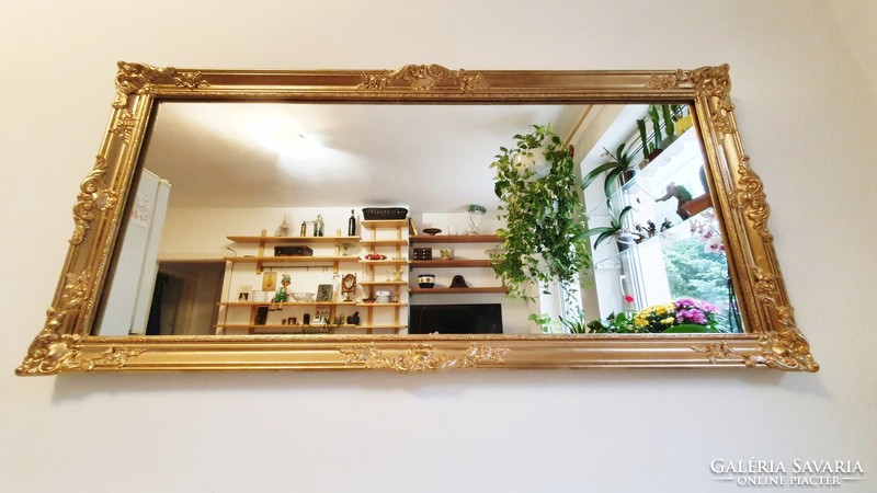 (H. ) Wonderful, antique, gold-colored, blonde frame, large mirror. 62X 131 cm.