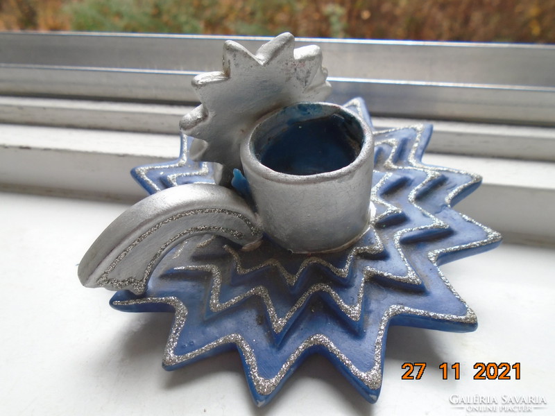 Christmas candle holder with a blue star base and a silver-plated sunburst face