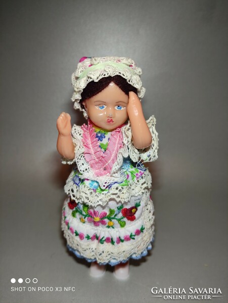 Vintage doll in folk costume in box