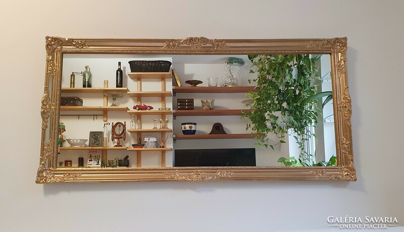 (H. ) Wonderful, antique, gold-colored, blonde frame, large mirror. 62X 131 cm.