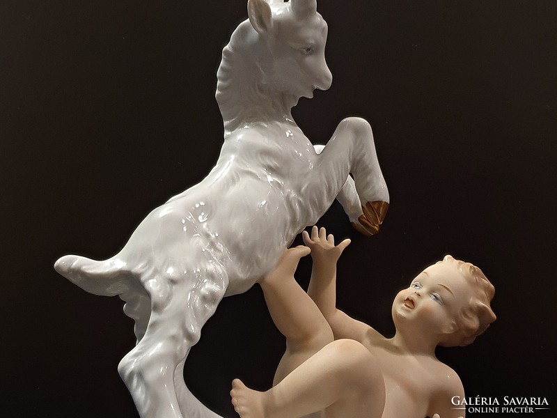 Flawless wallendorf porcelain (statue, figure). Puttó, with a stone goat.