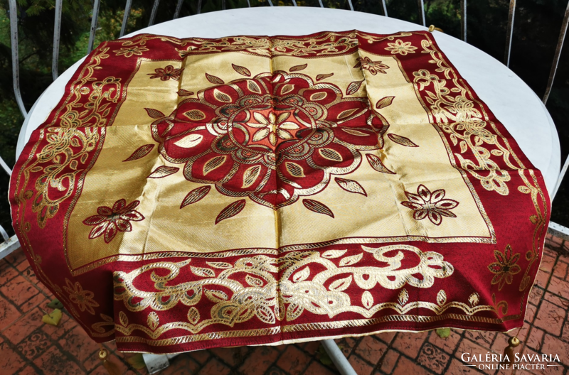 Festive gold-burgundy tablecloth