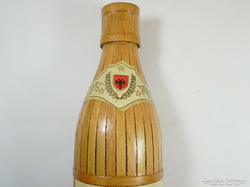 Retro old paper label wood covered glass bottle - Skenderbeu brandy Albania drink - 1980s 0.5 l