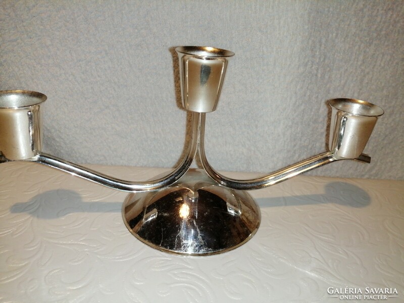 Elegant, silver-colored, metal, 3-branch table candle holder, decoration.