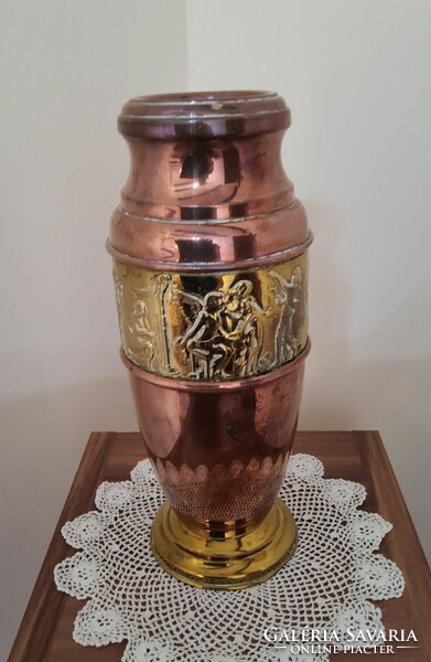 Embossed vase decorated with copper and brass
