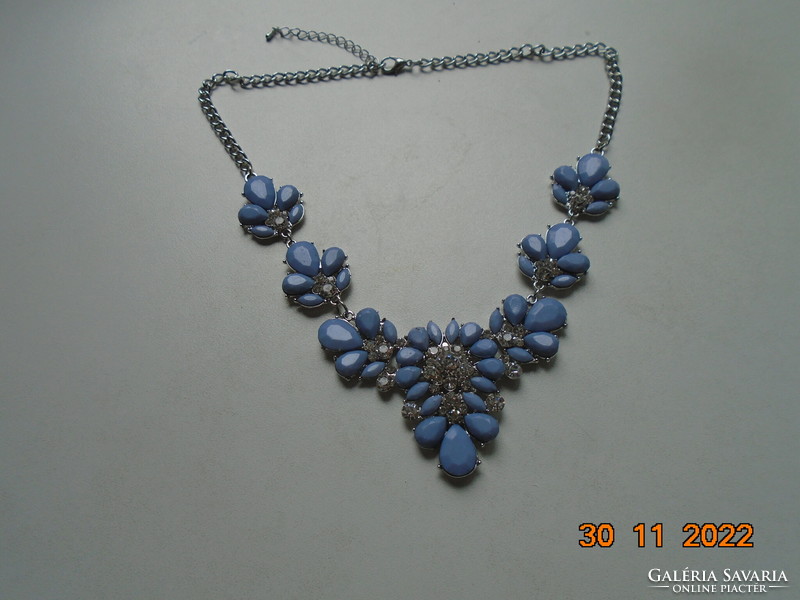 Faceted pale blue with purple stones in a silver-plated socket, flower necklace