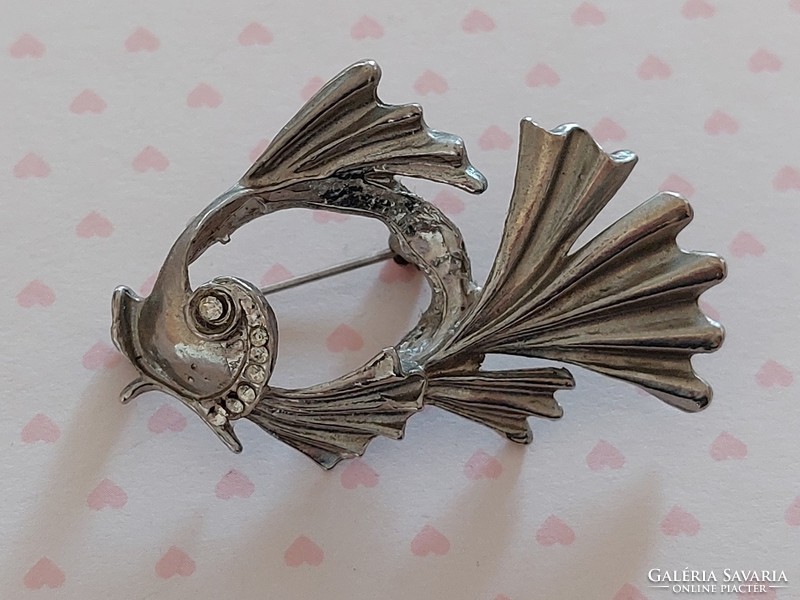 Old brooch fish shaped metal badge