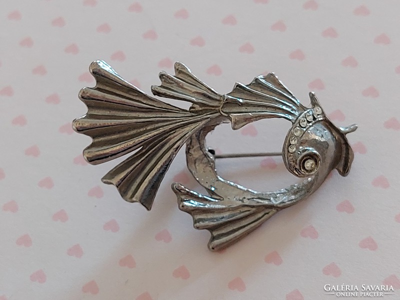Old brooch fish shaped metal badge