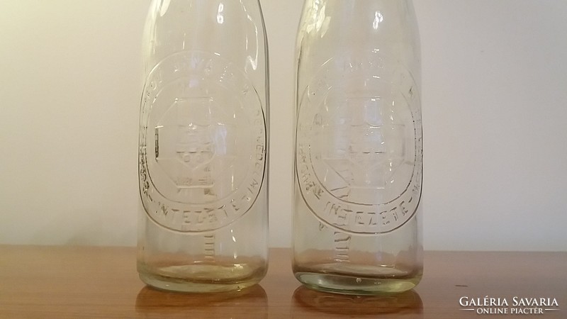 Old little milk bottle from Budapest head. Mother and baby institute milk bottle