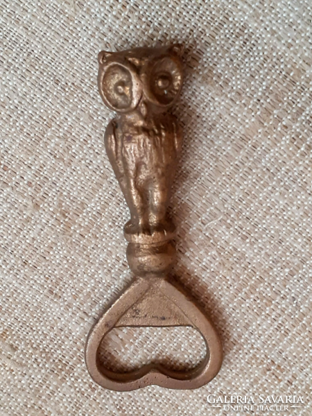Old brass beer opener in the shape of an owl