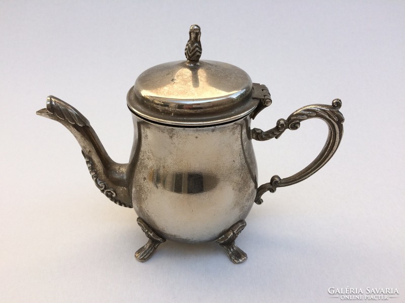 Baroque nature old metal coffee pot with vintage spout