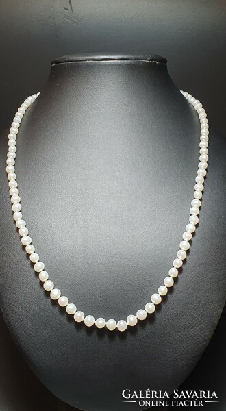Super white freshwater pearl string with gold clasp