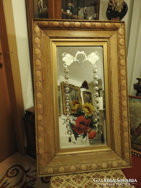 Huge polished, painted mirror specialty in carved wooden frame