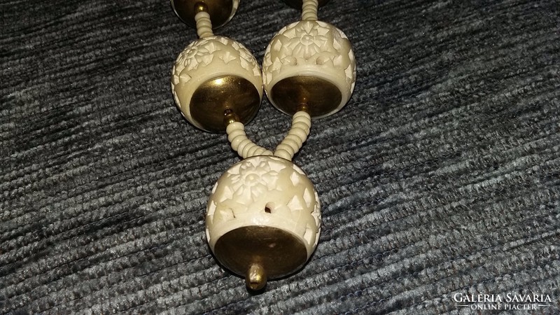 Carved bone necklace with copper balls and plates