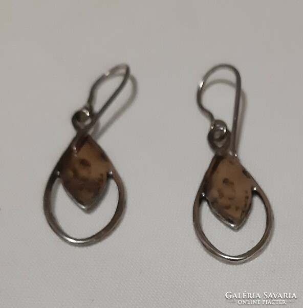 A beautiful pair of hammered marked silver earrings